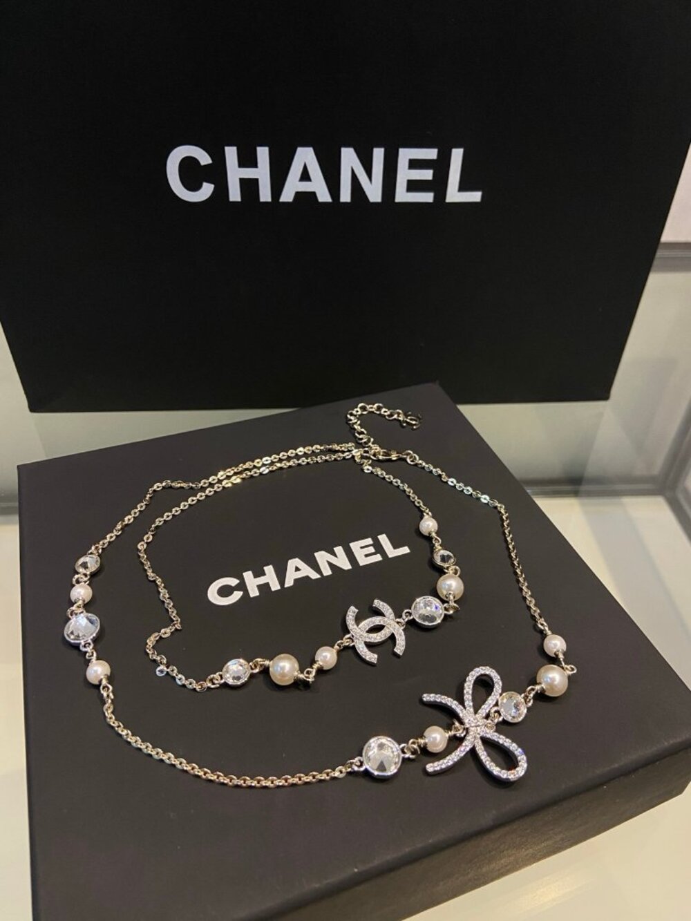 Chanel Silver-Tone Pearl Crystal CC Bow Long Necklace